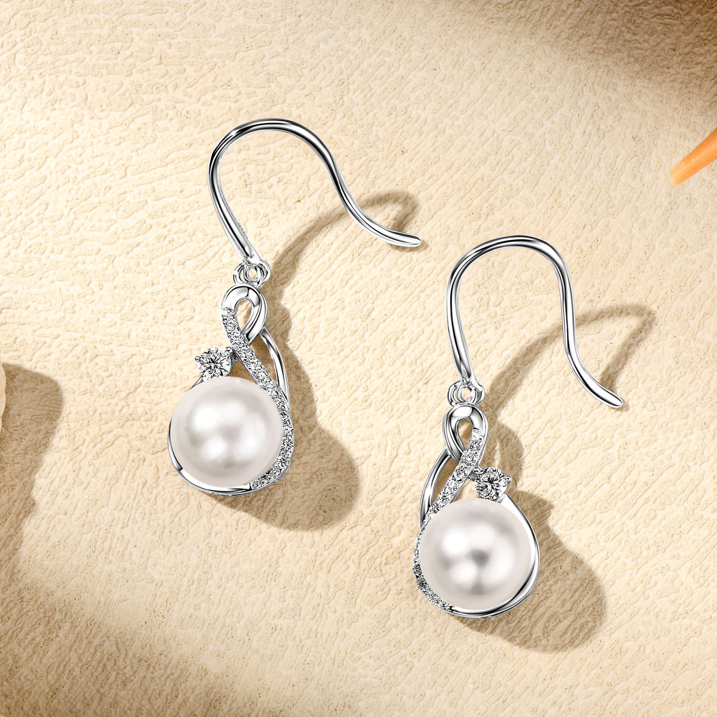 brincos pérola celeste