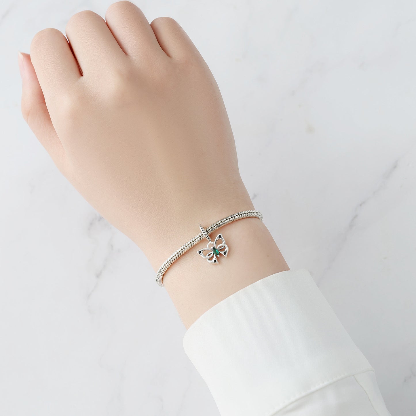 berloque borboleta encantada esmeralda