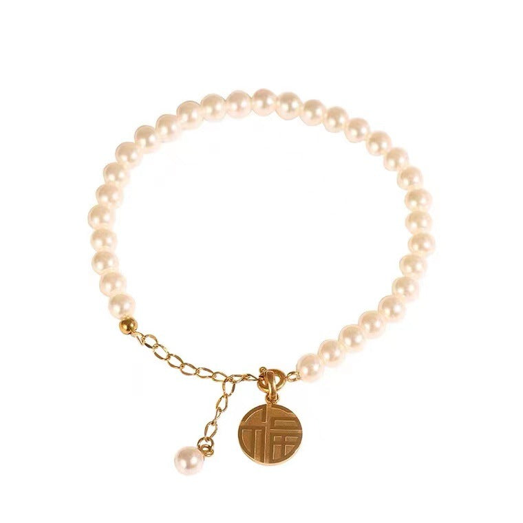 pulseira talismã de pérolas