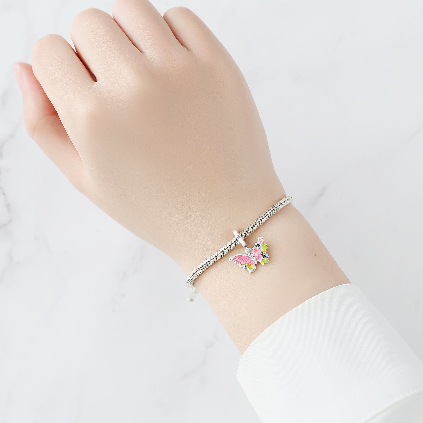 berloque borboleta voo florido