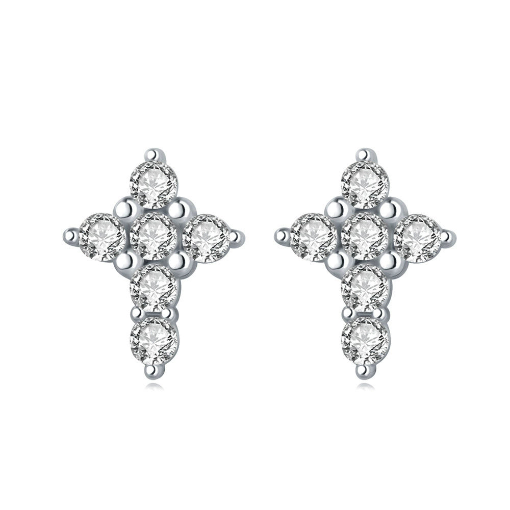 brinco cruz cravejada