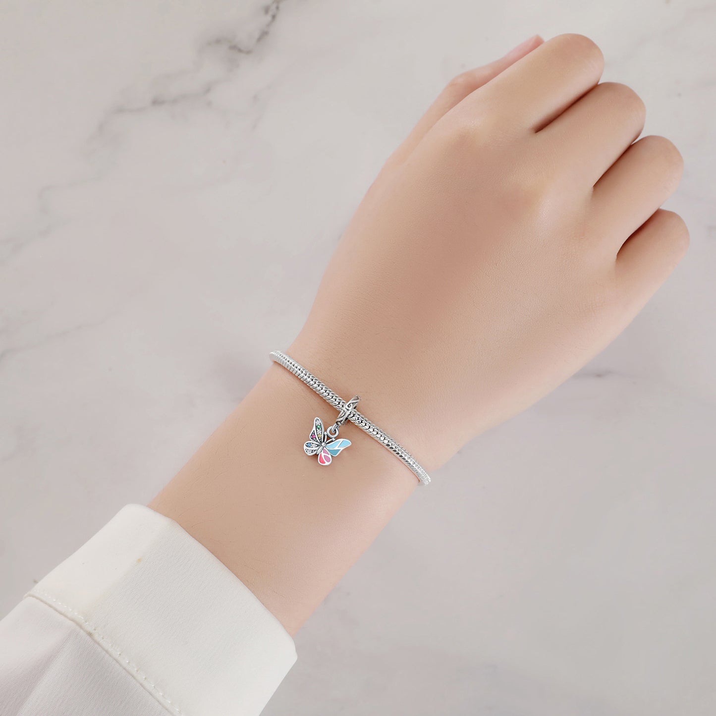 berloque borboleta arco-íris