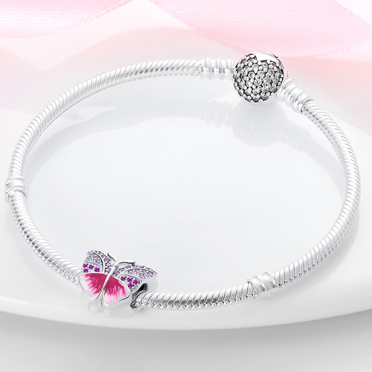 berloque borboleta pink cravejada