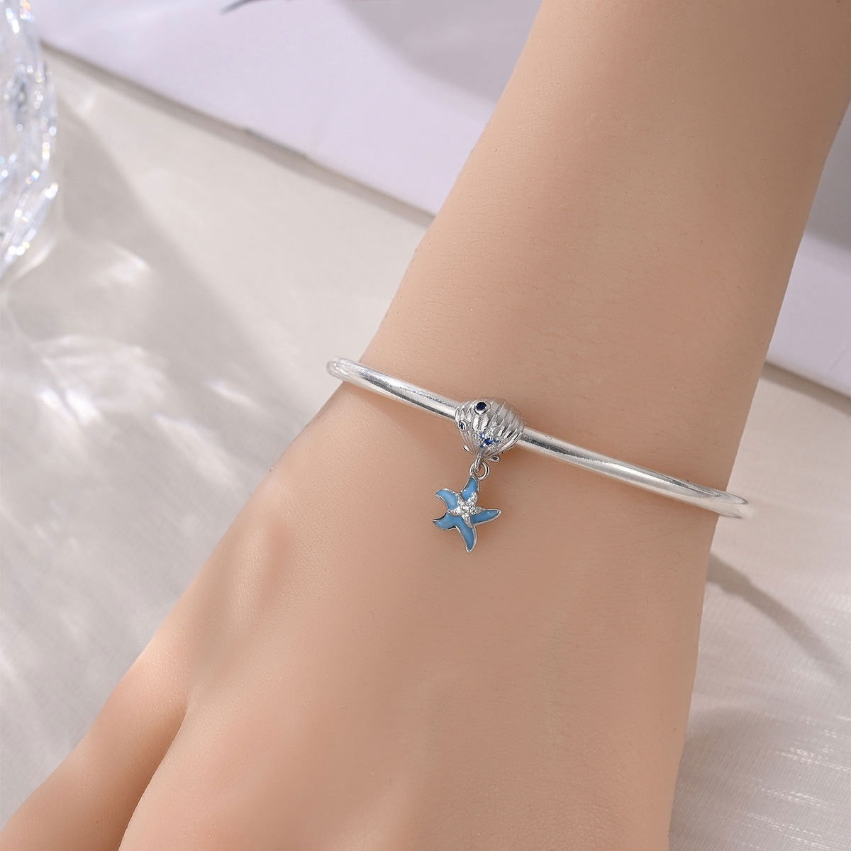 berloque oceano de brilho