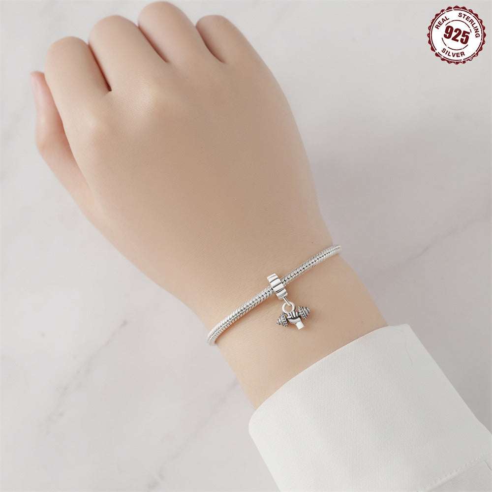 berloque haltere de potência